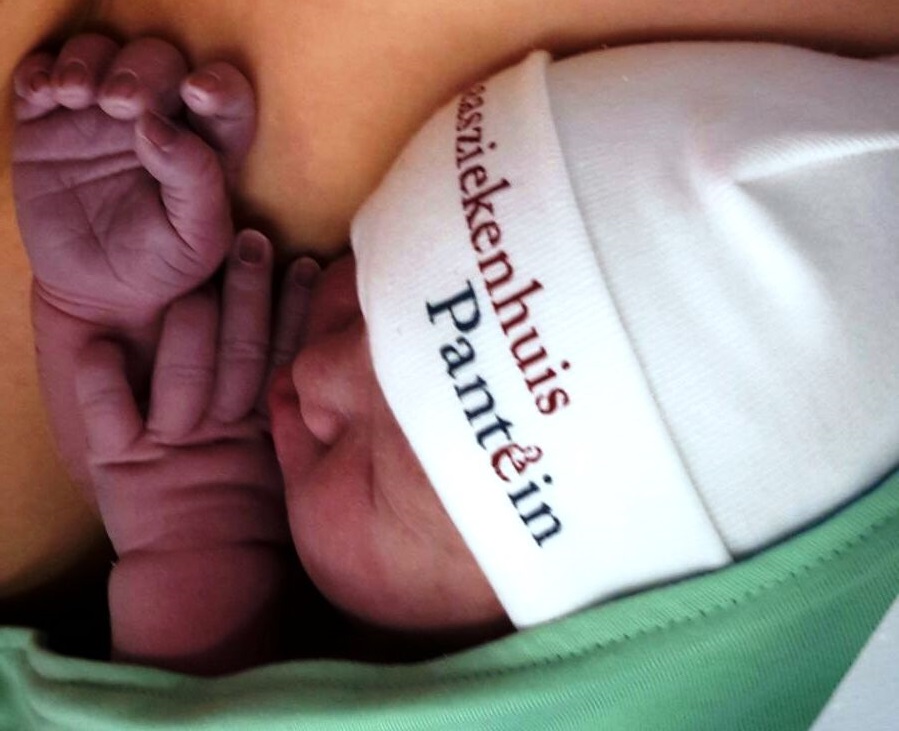 Baby met mutsje Baby met mutsje